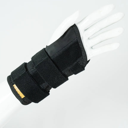 Black wrist support brace on a white background