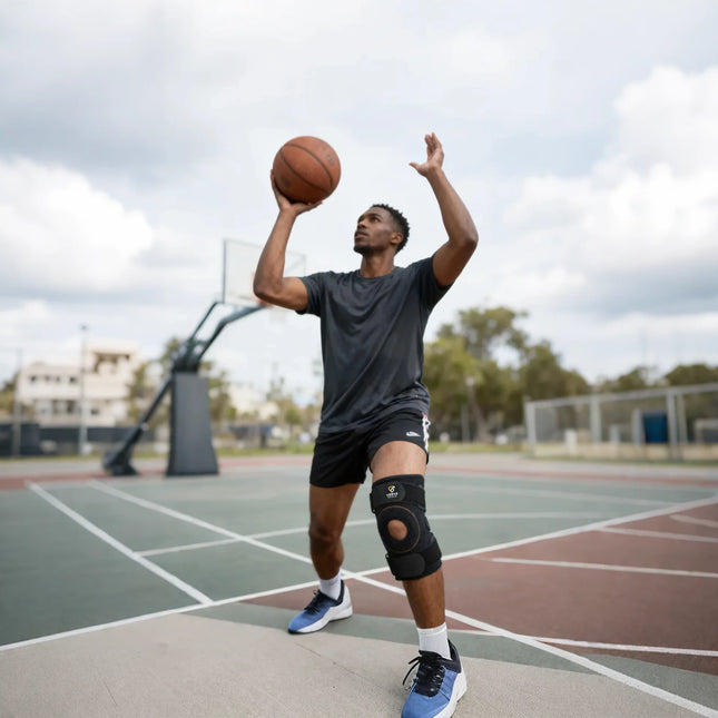 Person preparing to shoot a basketball on an outdoor court
